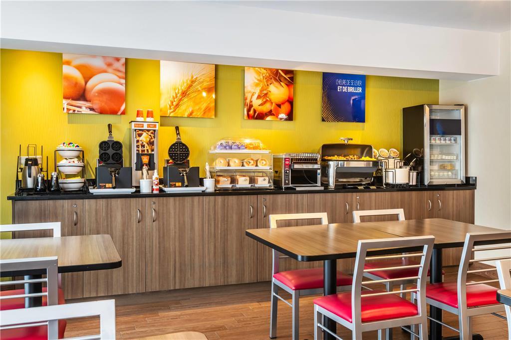 Comfort Inn Гатіно Ресторан фото